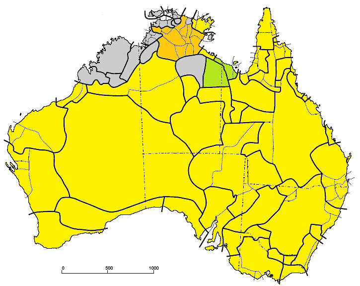 Map of Australia with Pama–Nyungan languages in yellow across most of the mainland; other language groups appear in green, orange and grey.